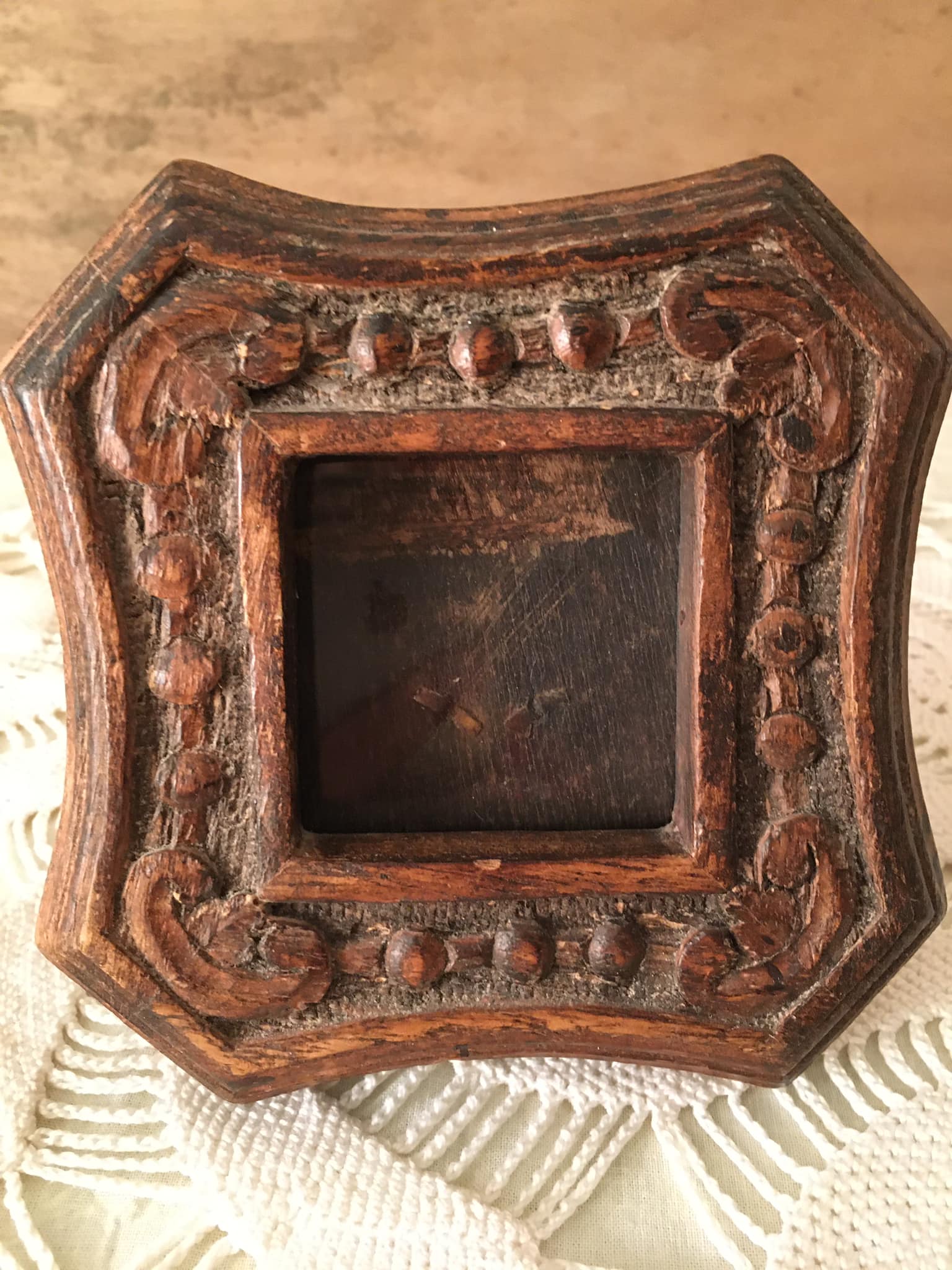Photo frame in worked wood.