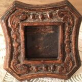 Photo frame in worked wood.