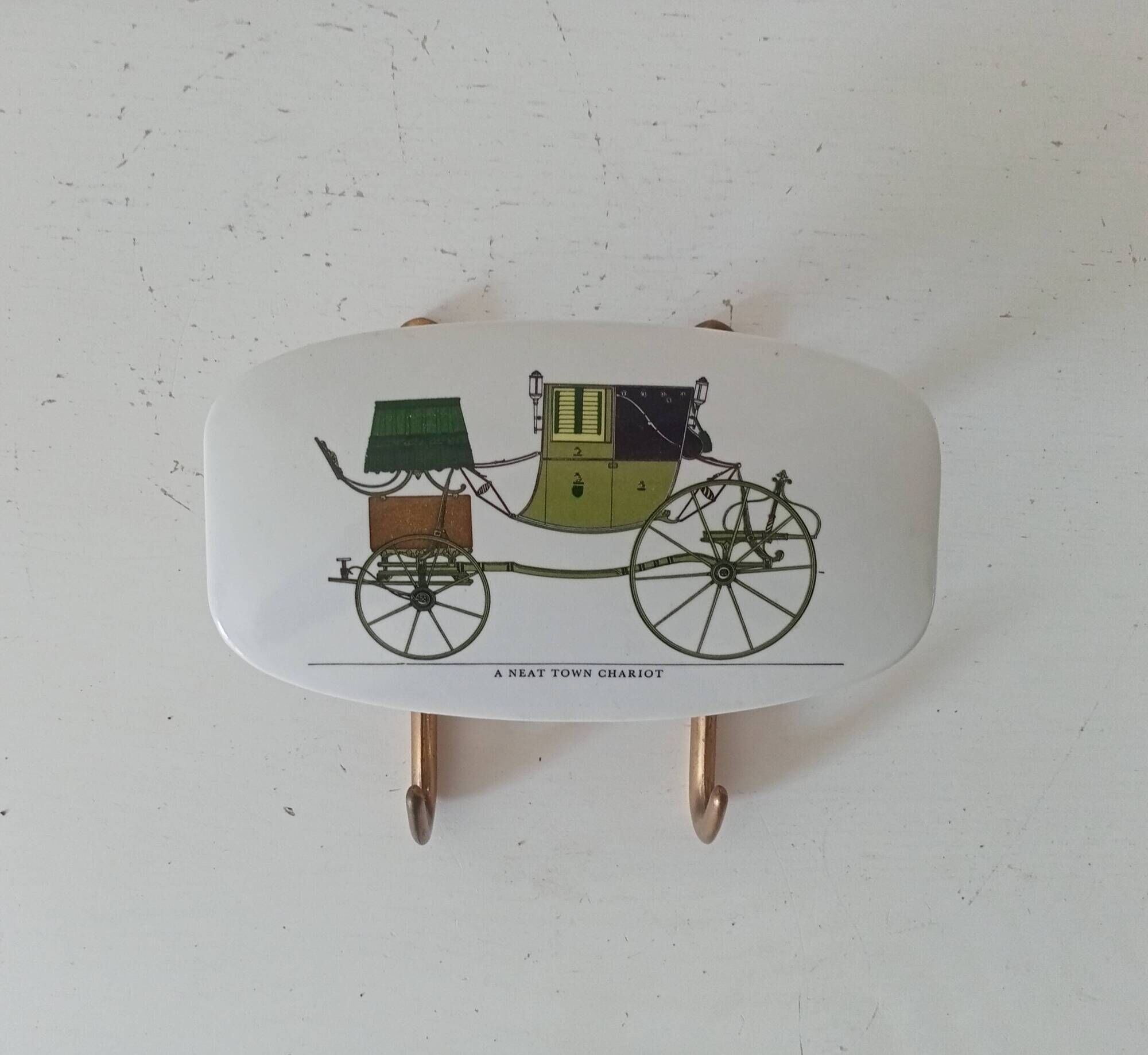 Set of 2 wall coat hooks in Bakelite and brass from the 1950s/60s.