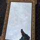 Large gold mirror in Louis XVI style with laurel crown, 121 cm.