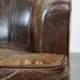 Stylish armchair made of cowhide leather with a unique design and beautiful finish