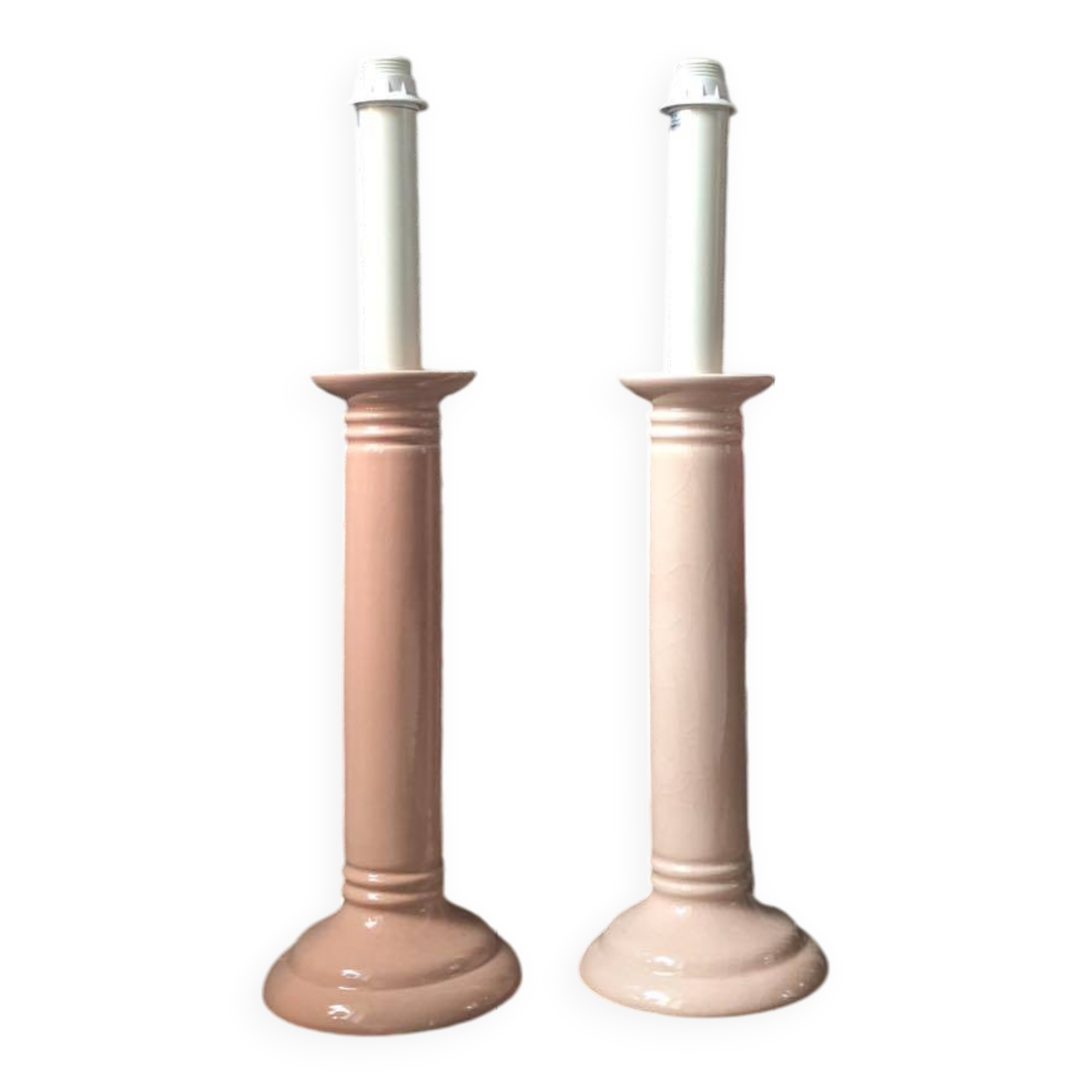 Pair of vintage salmon pink candlestick shaped ceramic lamp bases