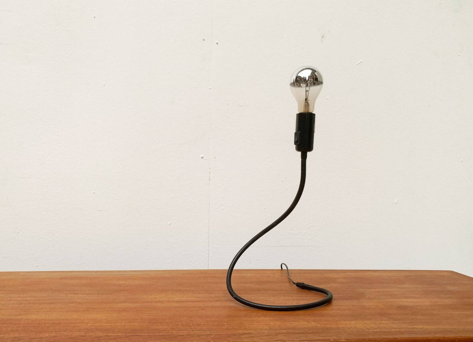Lightworm minimalist table lamp by Walter Schnepel for Tecnolumen.