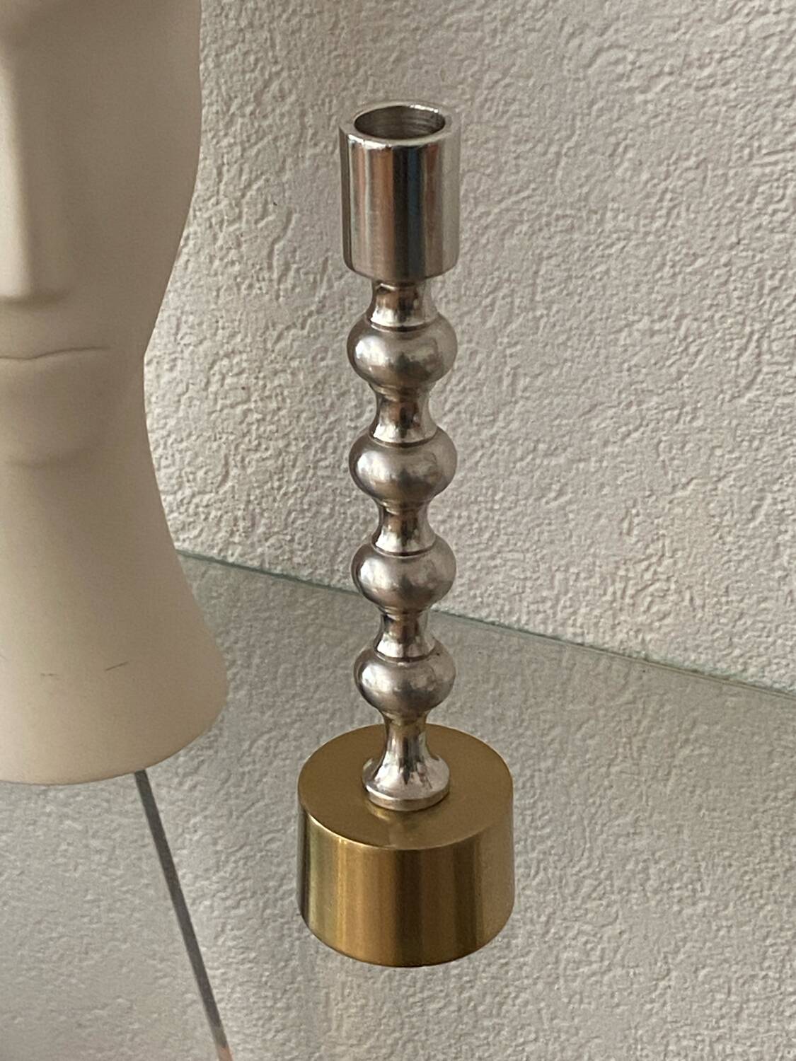Silver and gold metal candle holder