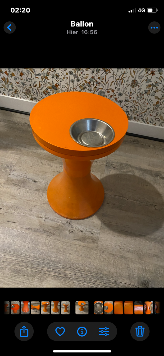 Orange tam-tam by Stamp with integrated pocket.