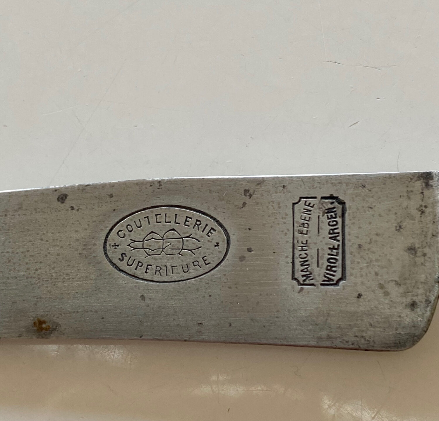 Antique table knives in ebony and steel blade