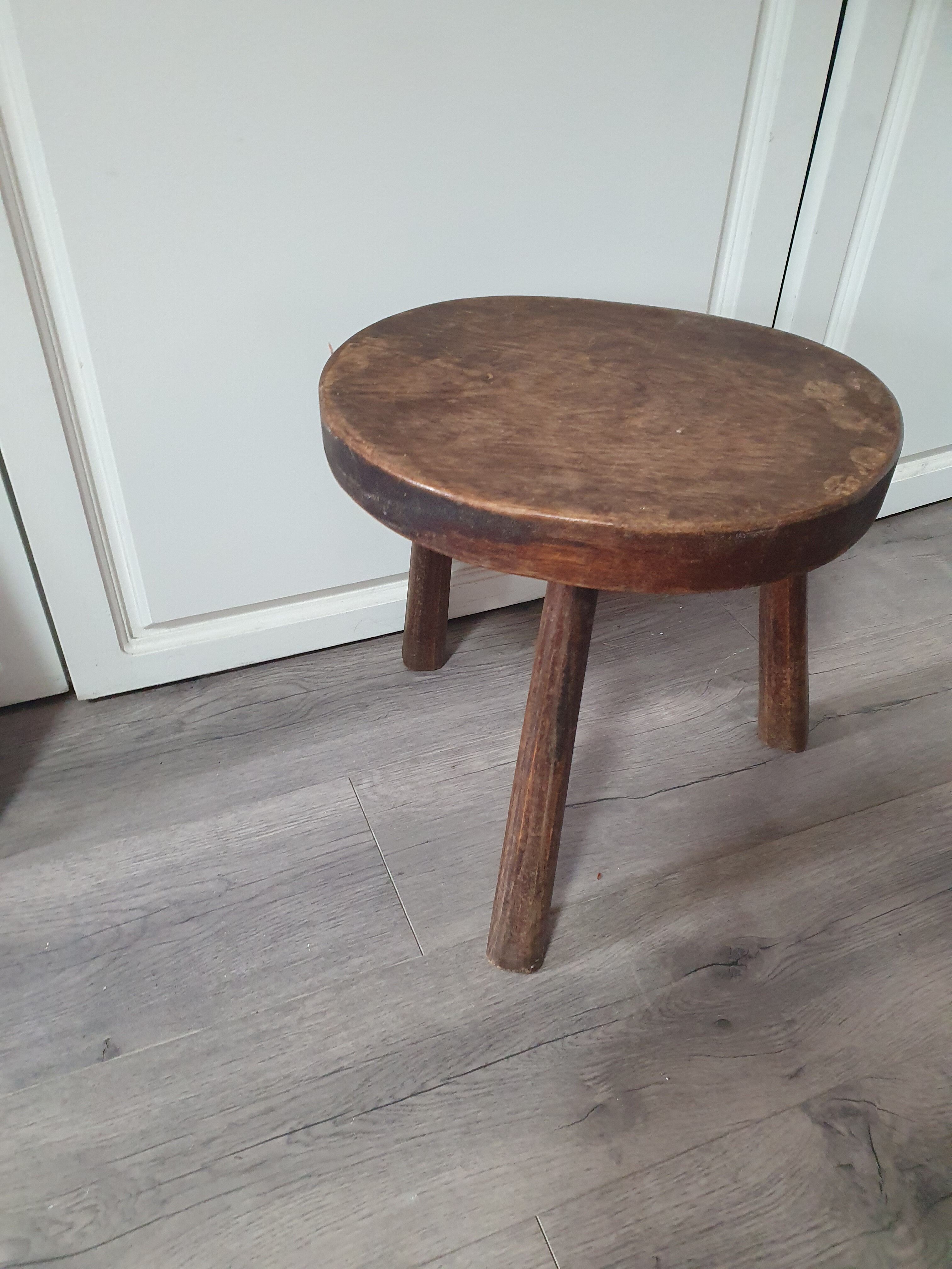 Vintage old wooden stool tripod