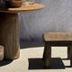 Small stool, square solid teak side table with a curved seat.