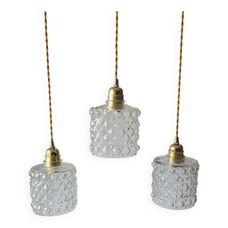 Trio of molded glass pendant lights