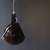 Suspended, hinged ball spot