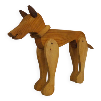 Articulated wooden dog toy. 1940s