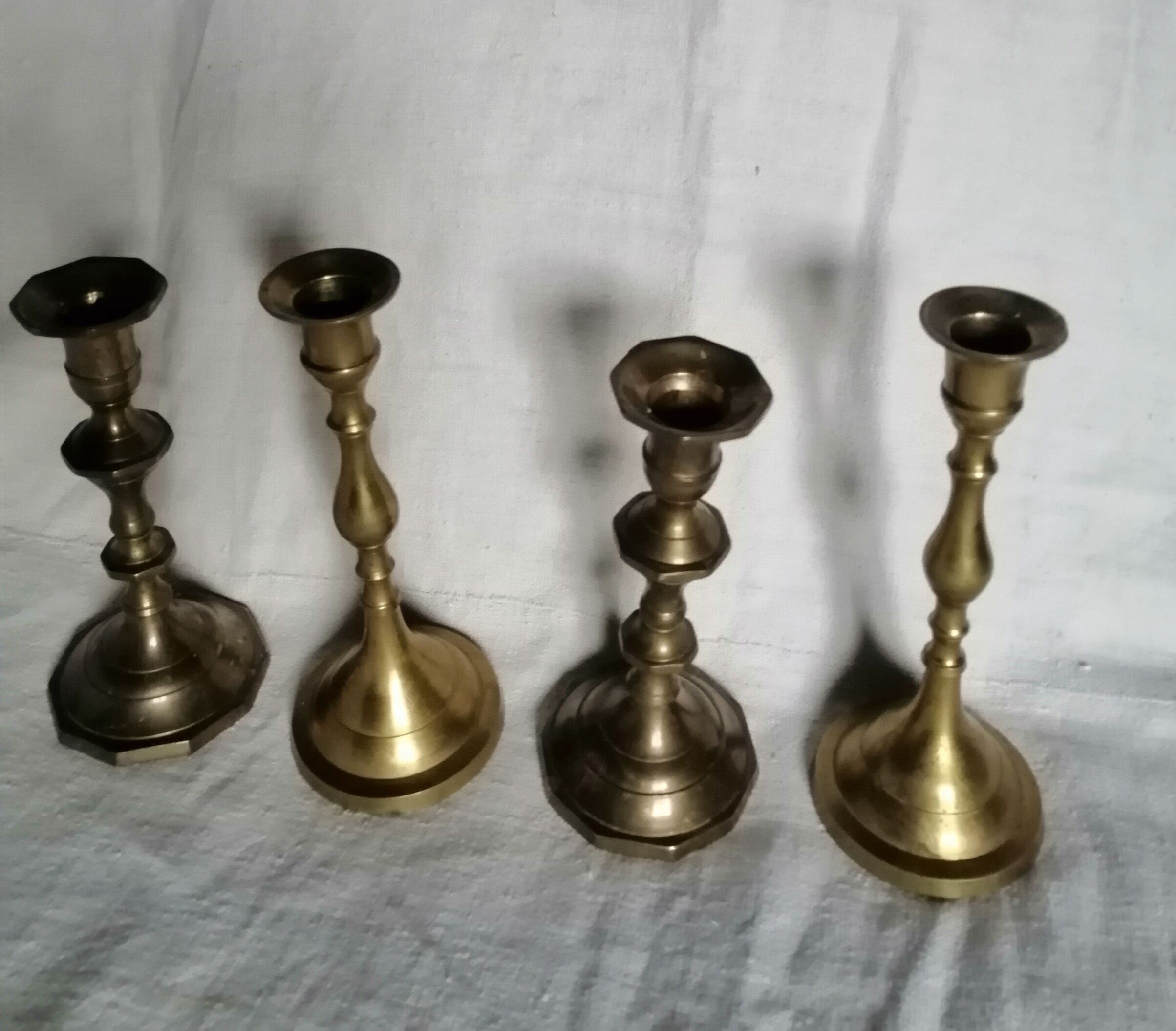 Set of 4 brass candle holders