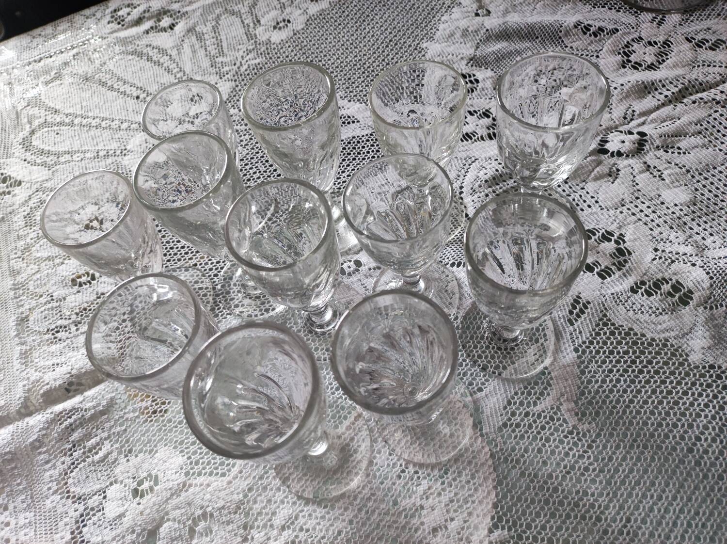 12 small twisted bistro glasses, 19th century