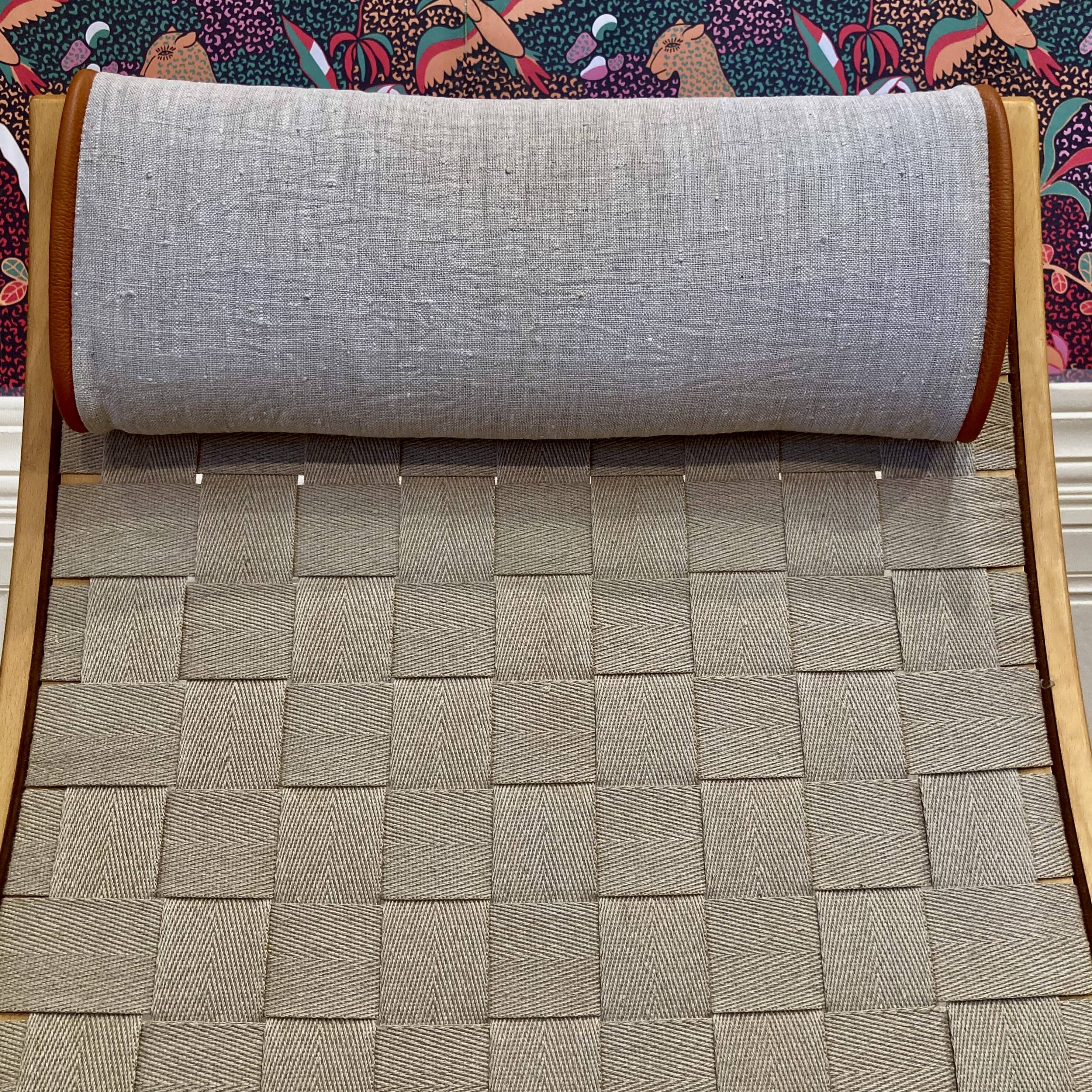 Swivel armchair and its ottoman in 1960s Scandinavian design.