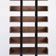 Severin 3 library in American walnut and matte black steel.