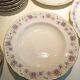 Table service 31 pieces in porcelain. Floral polychrome pattern
