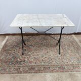 Bistro table with cast iron legs and marble top