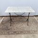Bistro table with cast iron legs and marble top