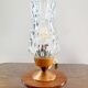 Vintage tripod table lamp from the 1960s with a glass lampshade.