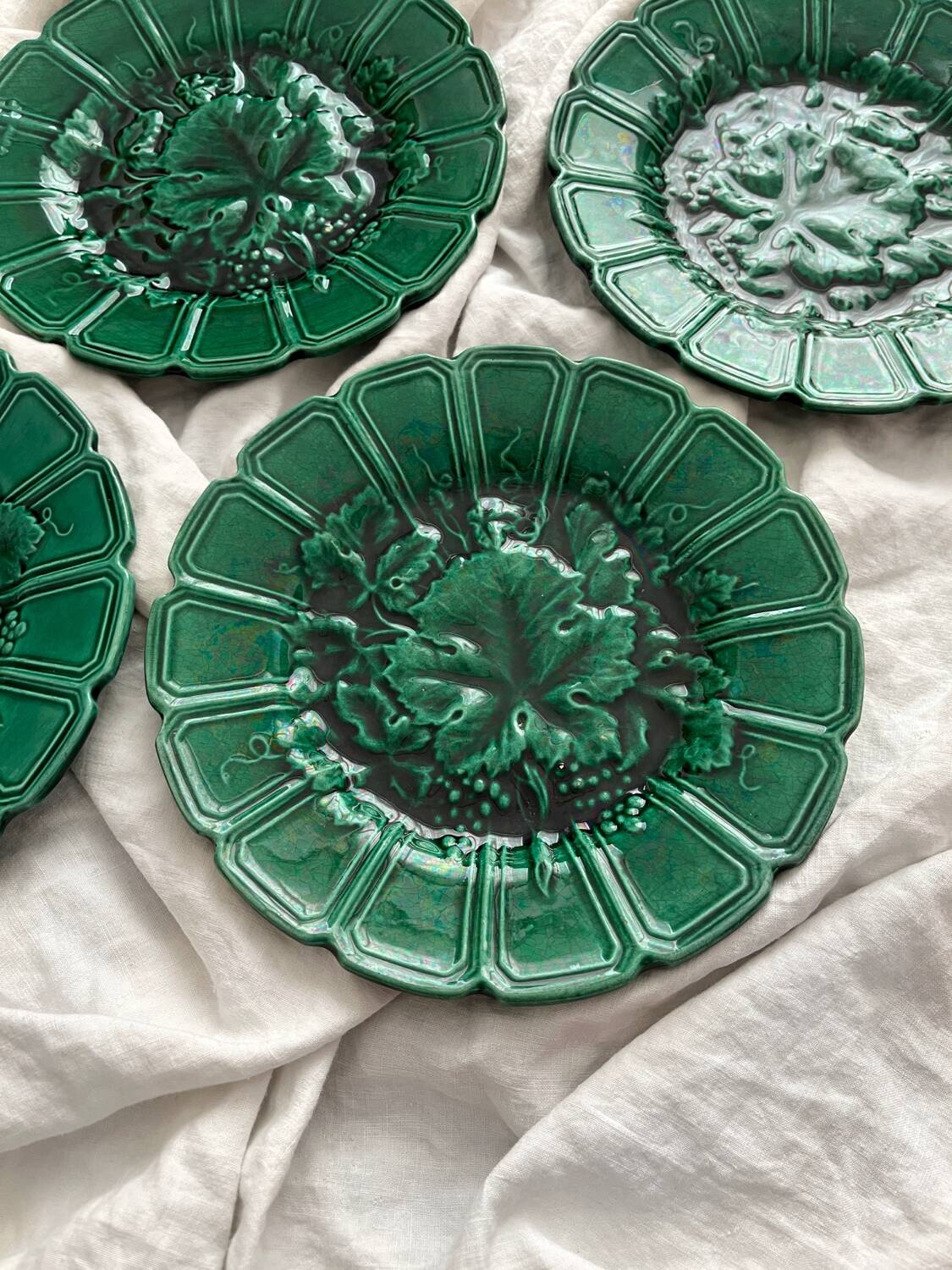 4 old plates in Sarreguemines vine leaf slip