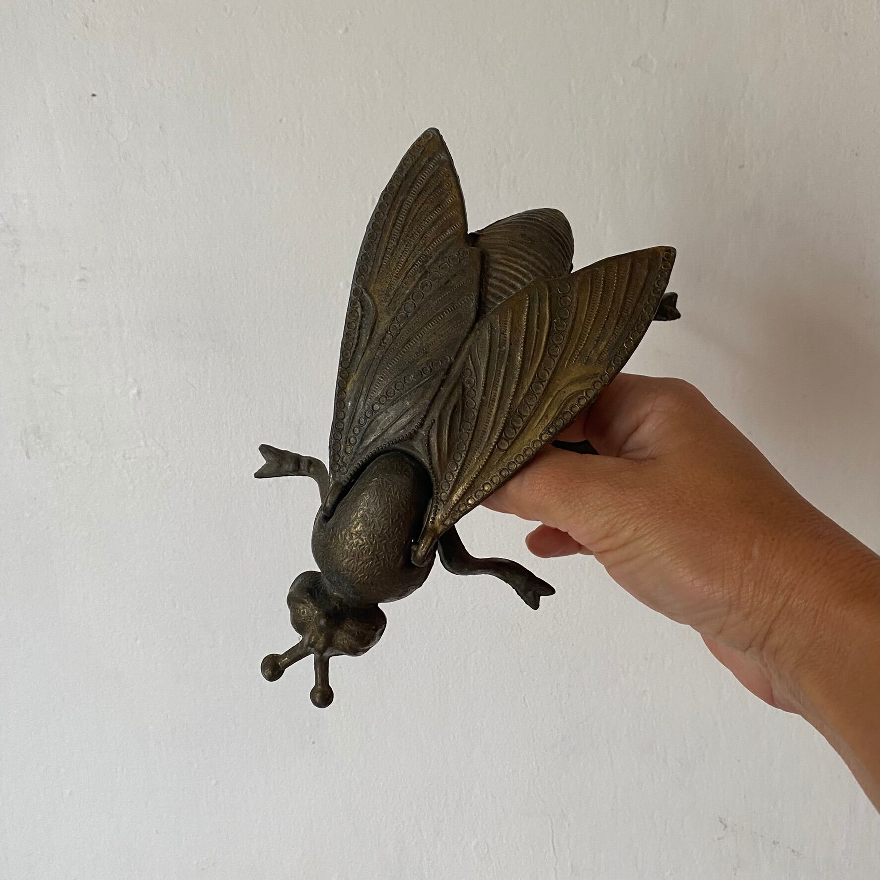 2 metal ashtrays with insect fly designs from the 1950s-60s.