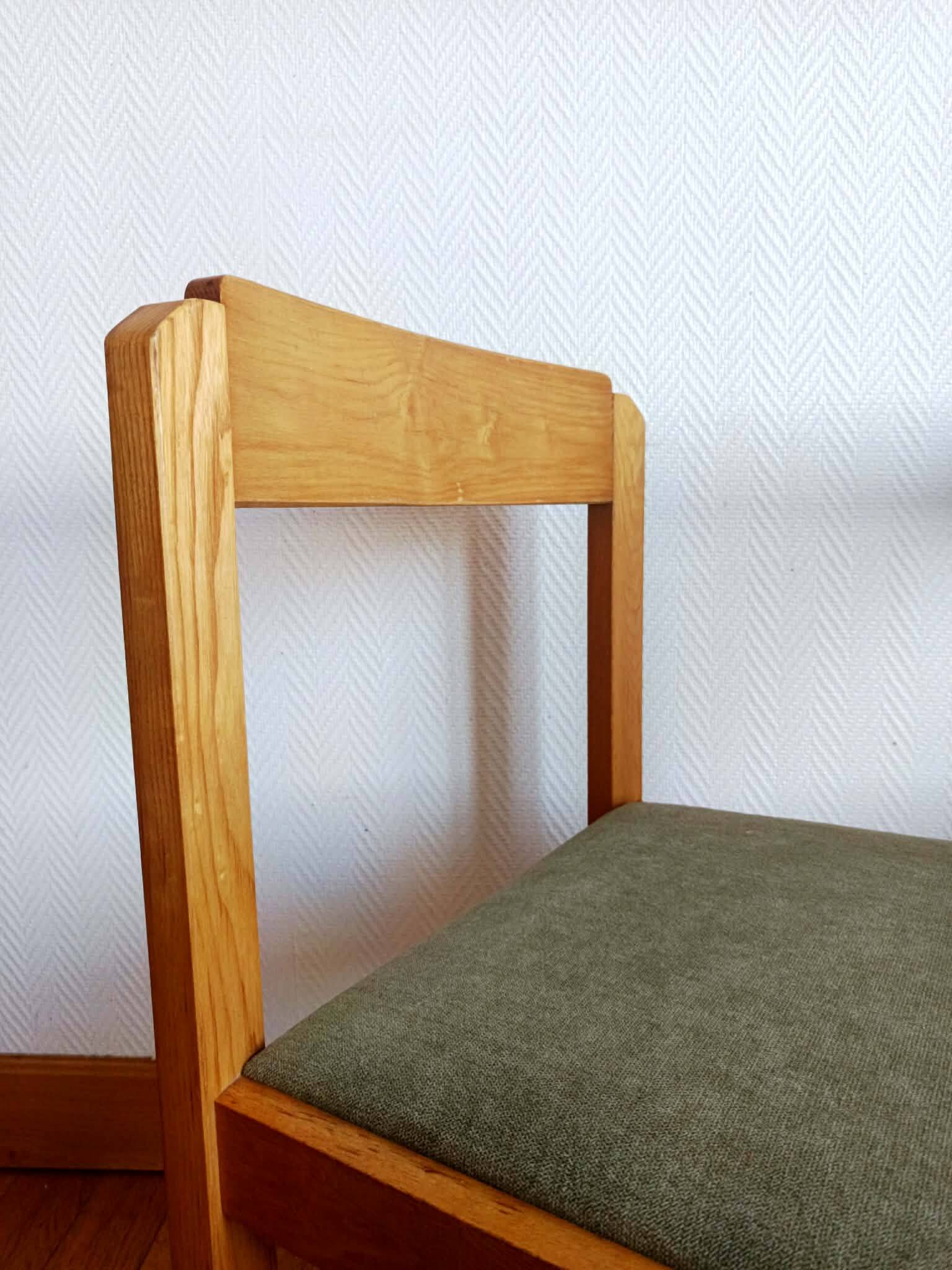 Six Scandinavian style chairs in elm and fabric.