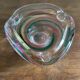 Clear with a soft coloured swirl pattern, round, glass ashtray