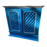 Large colonial style wooden cabinet with latticework