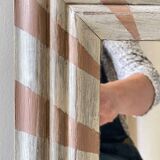 Old mirror in hand-painted wood