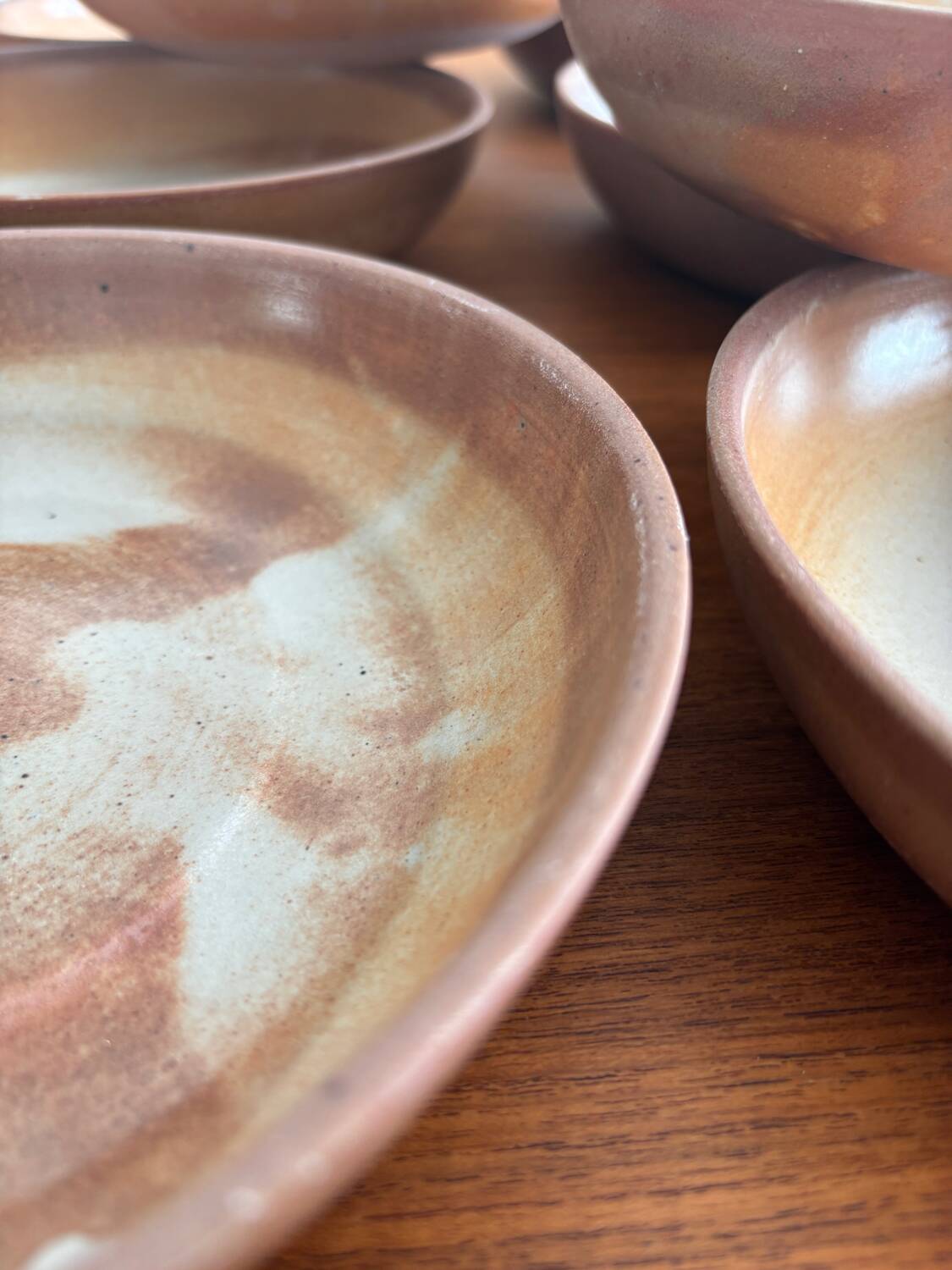Lot of vintage 1970s stoneware deep plates - handmade beige ceramics.