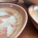 Lot of vintage 1970s stoneware deep plates - handmade beige ceramics.