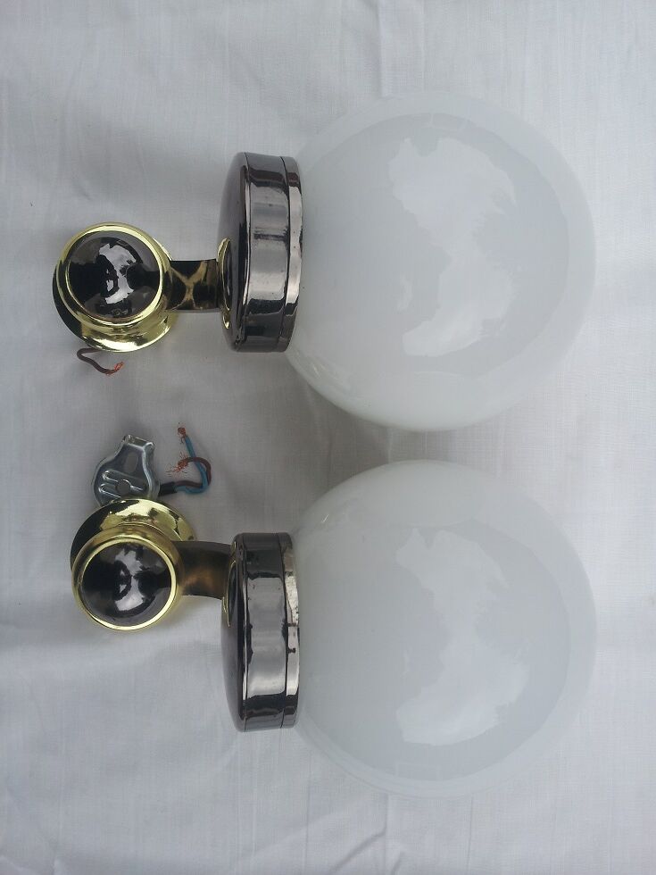 Pair of chromed and opaline metal wall lights