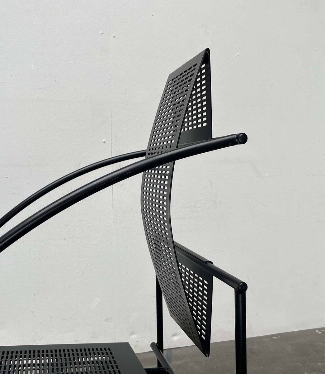 Postmodern black Quinta chair in perforated metal by Mario Botta for Alias, 1980s.