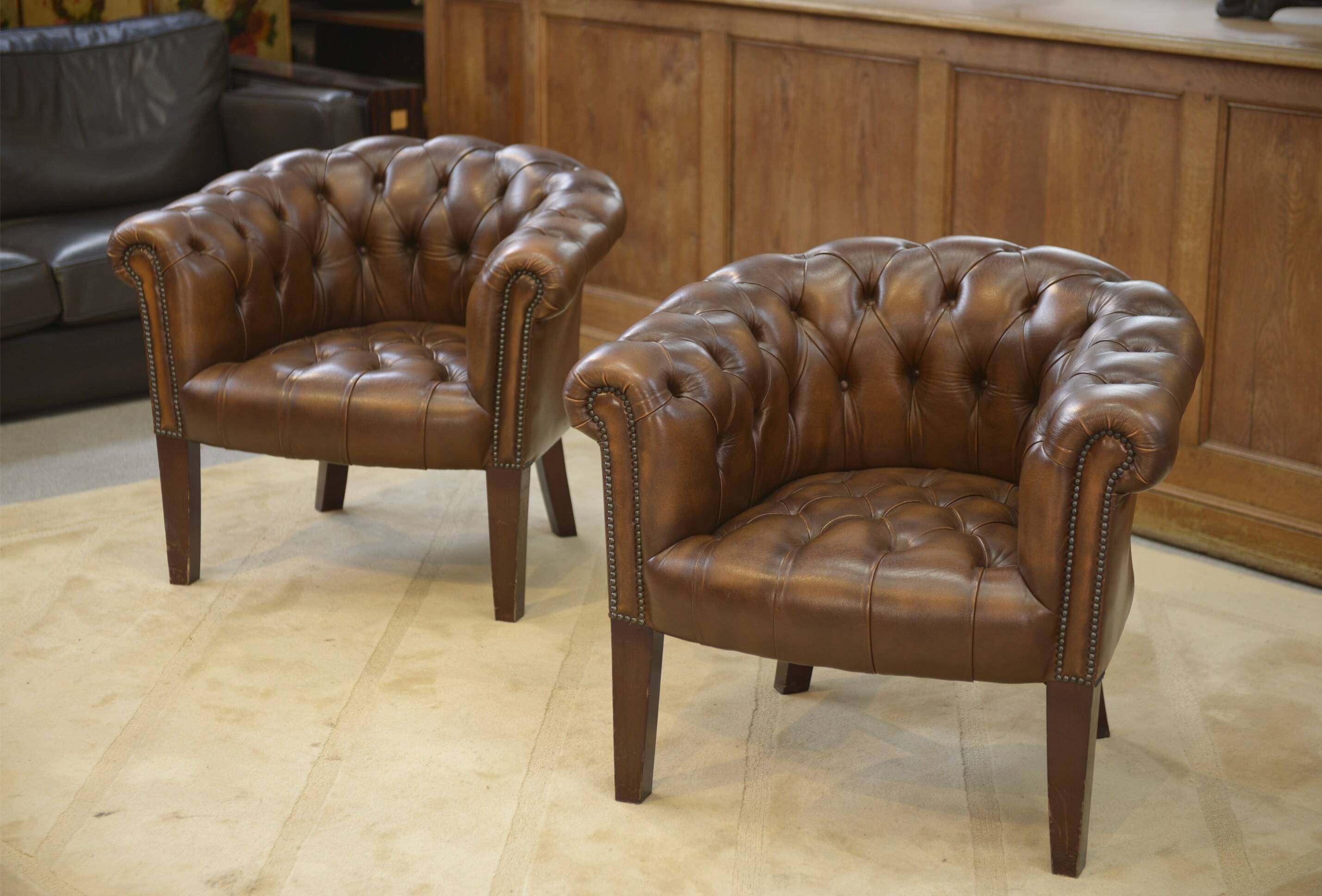 Pair of upholstered leather Club armchairs