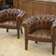 Pair of upholstered leather Club armchairs