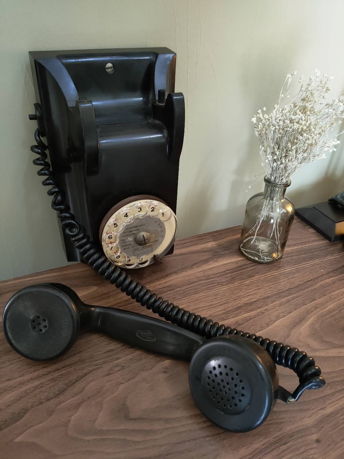 Old bakelite wall telephone
