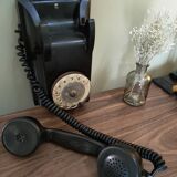 Old bakelite wall telephone
