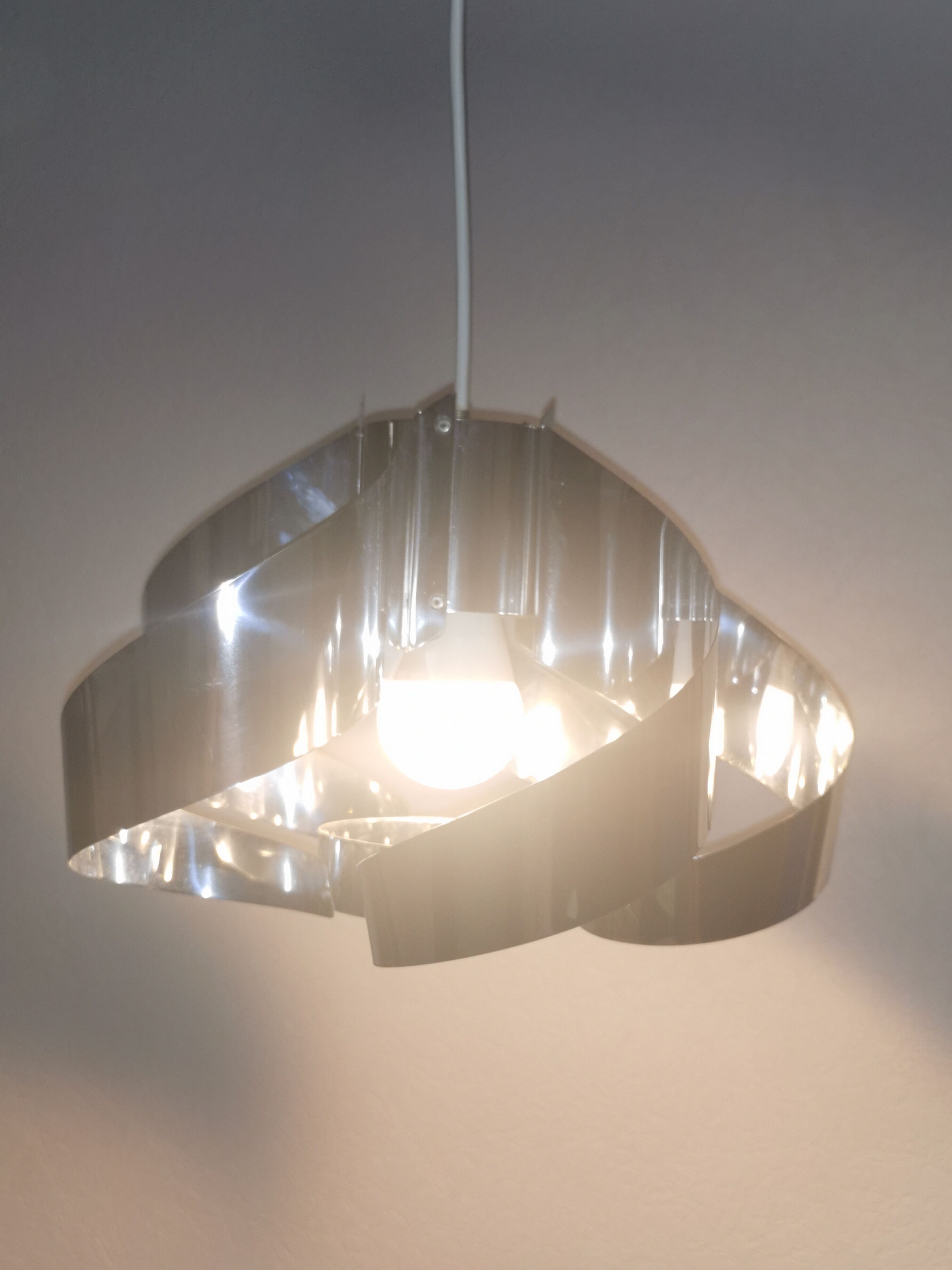 Curved stainless steel hanging lamp, Space Age, 1970