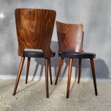 Pair of Dove chairs • Baumann • Black faux leather