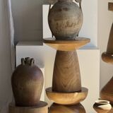 Natural solid mango side table (monoxyle) with conical legs.