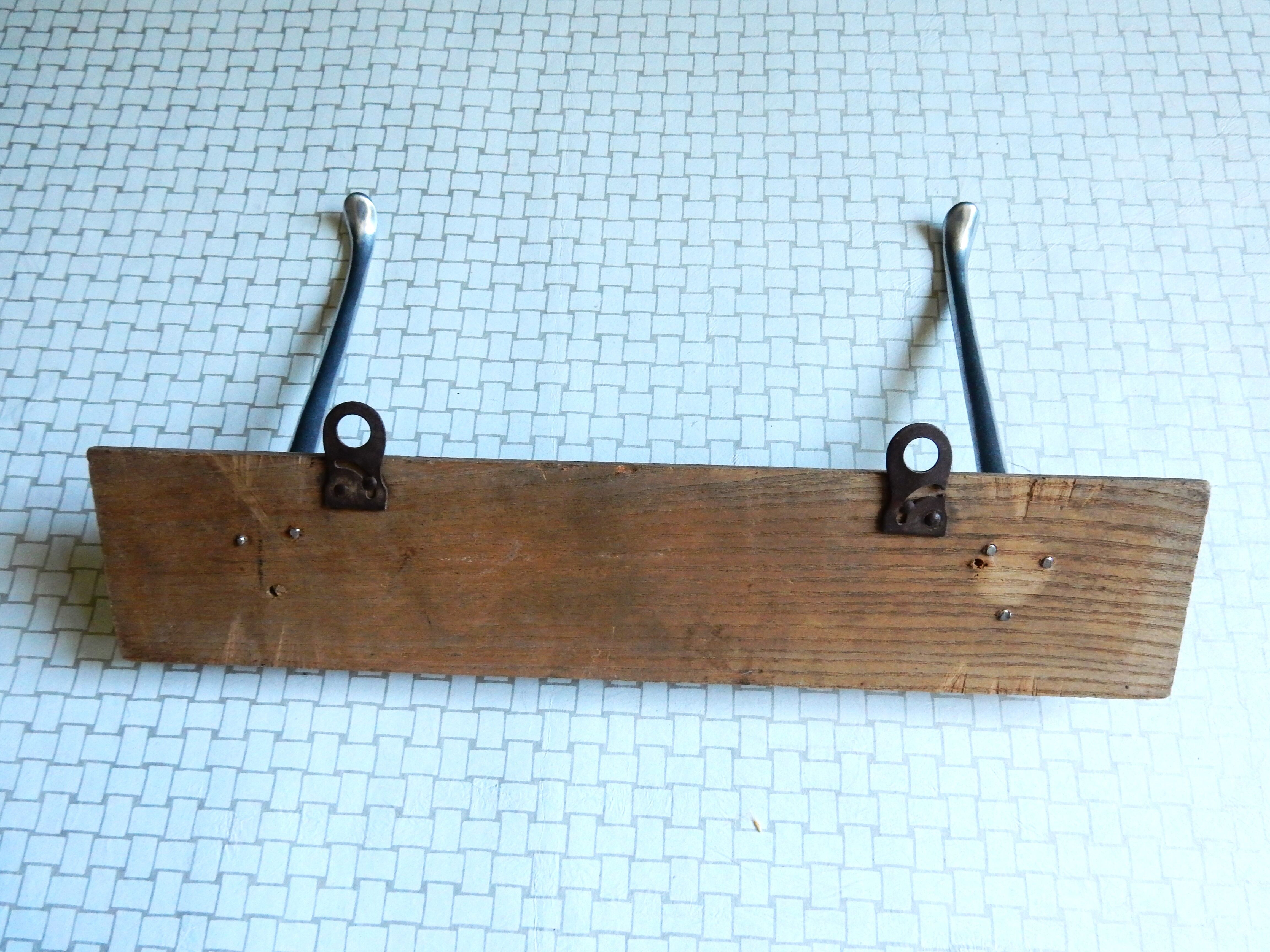 Double metal hook on wooden base