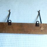 Double metal hook on wooden base