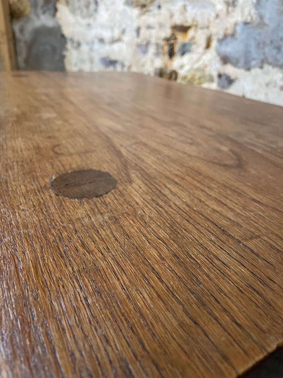 Small rustic table made of solid wood.