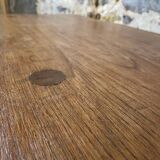 Small rustic table made of solid wood.