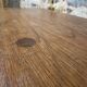 Small rustic table made of solid wood.