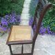Chaise ancienne en bois et assise cannée