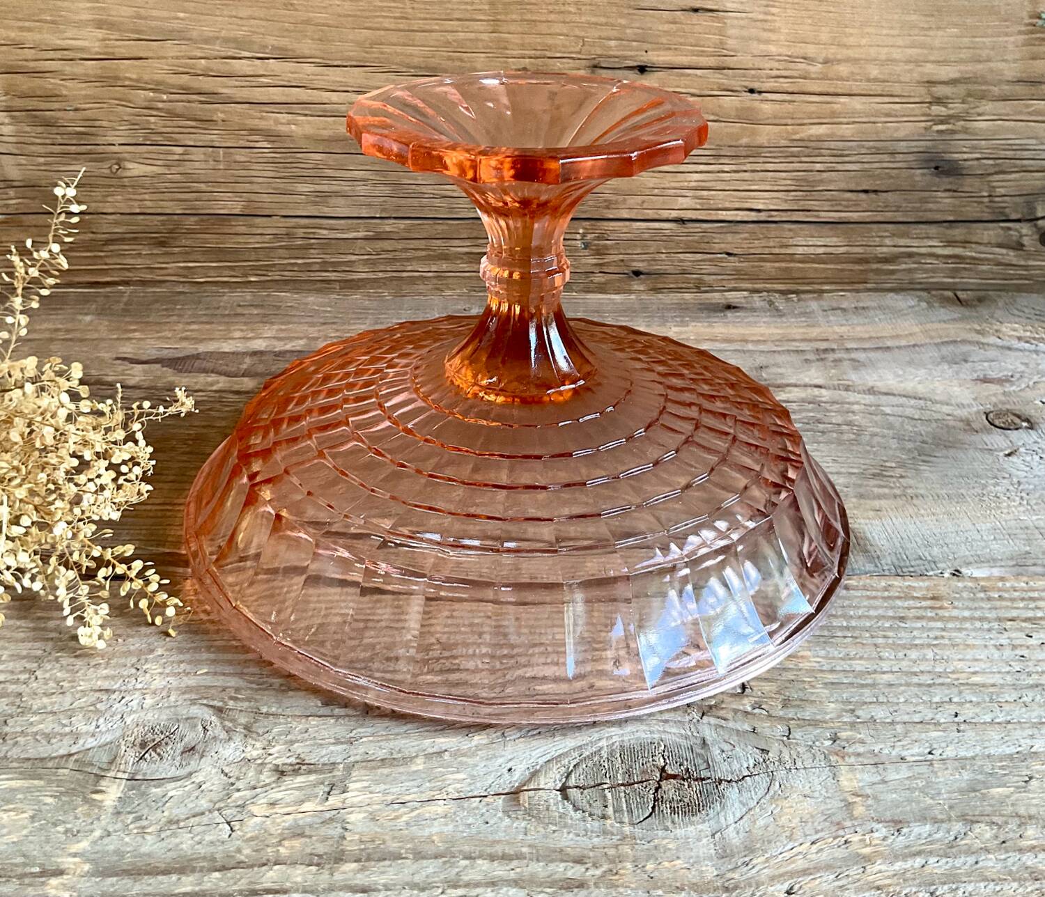 Pink glass cup, fruit bowl