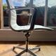 ICF armchair in white leather, four-star base on glides