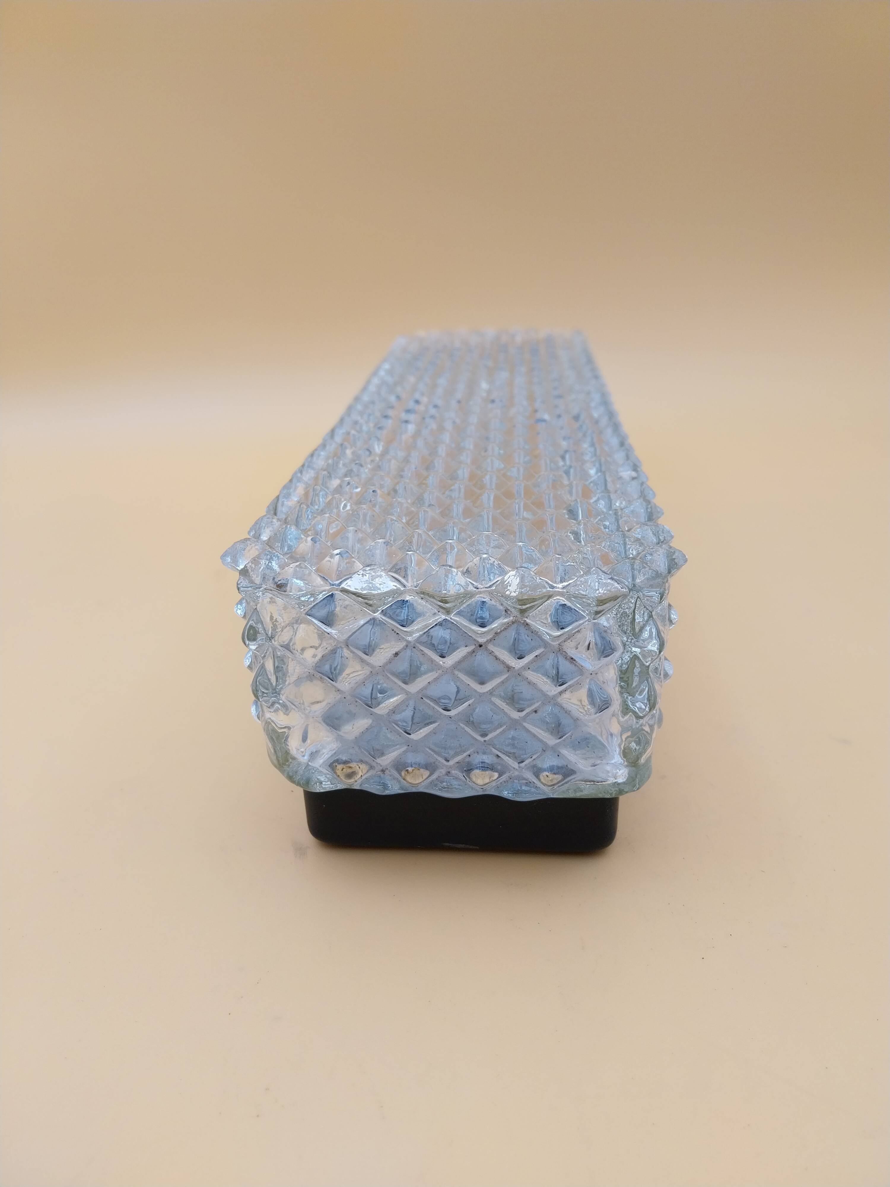 Applique en verre et métal