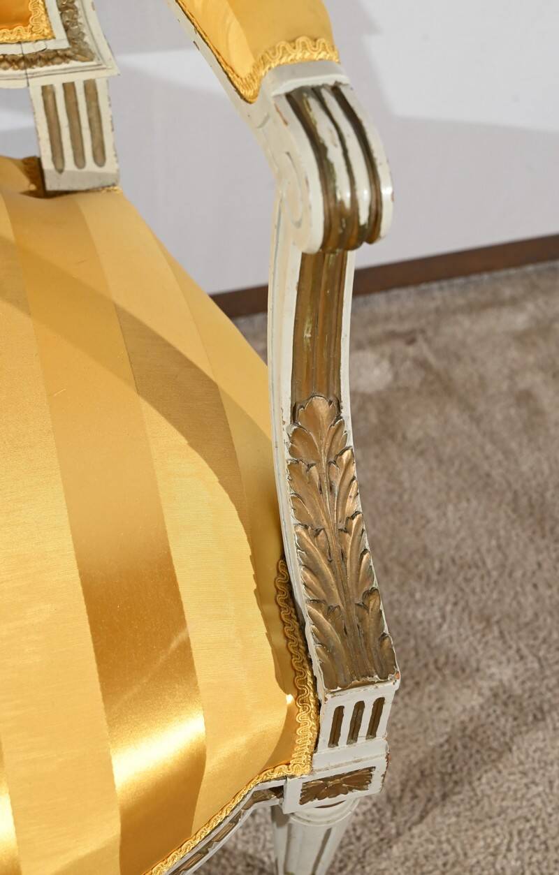 Pair of Cabriolet Armchairs, in rechampi wood, Louis XVI style – Late 19th century